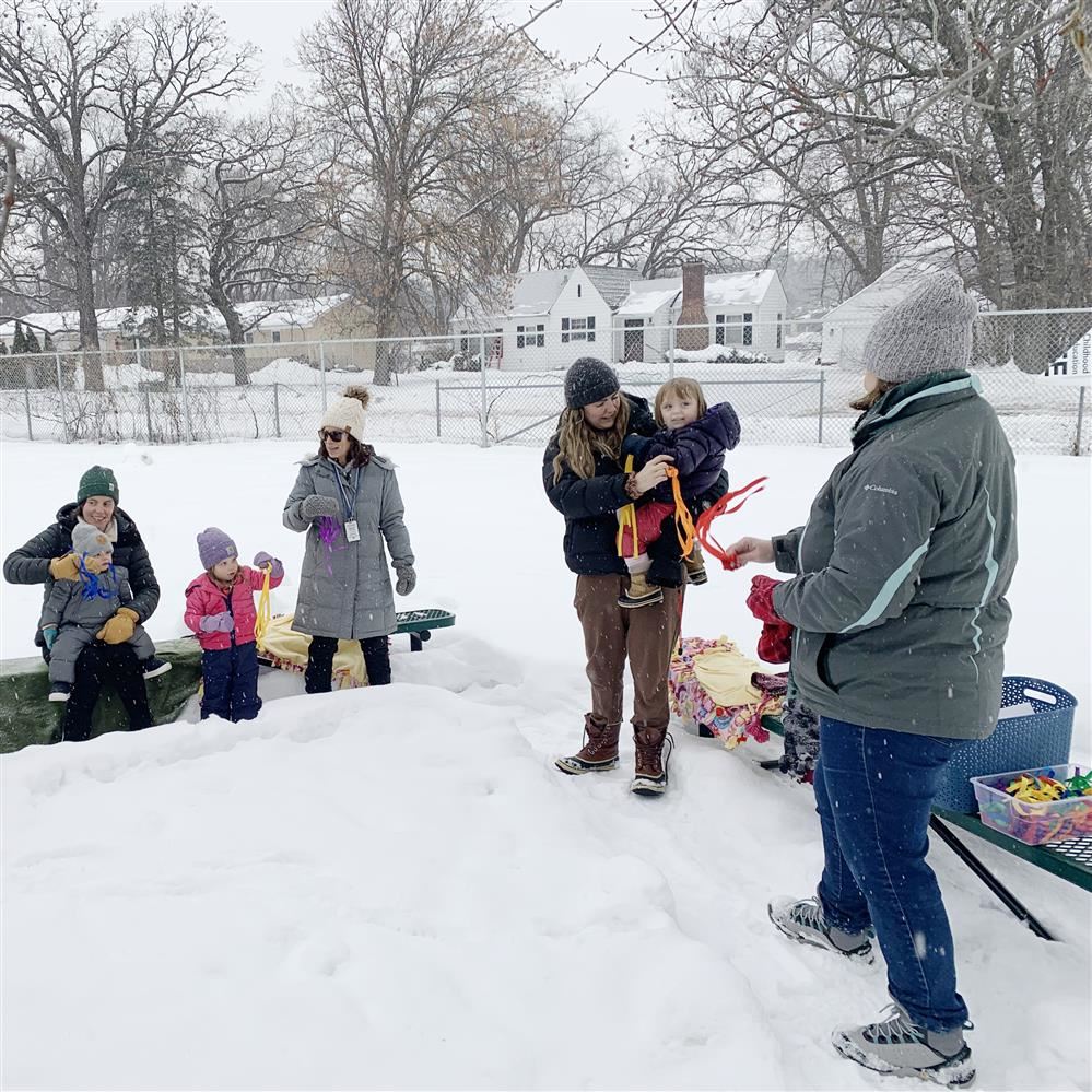  families outside for a winter class